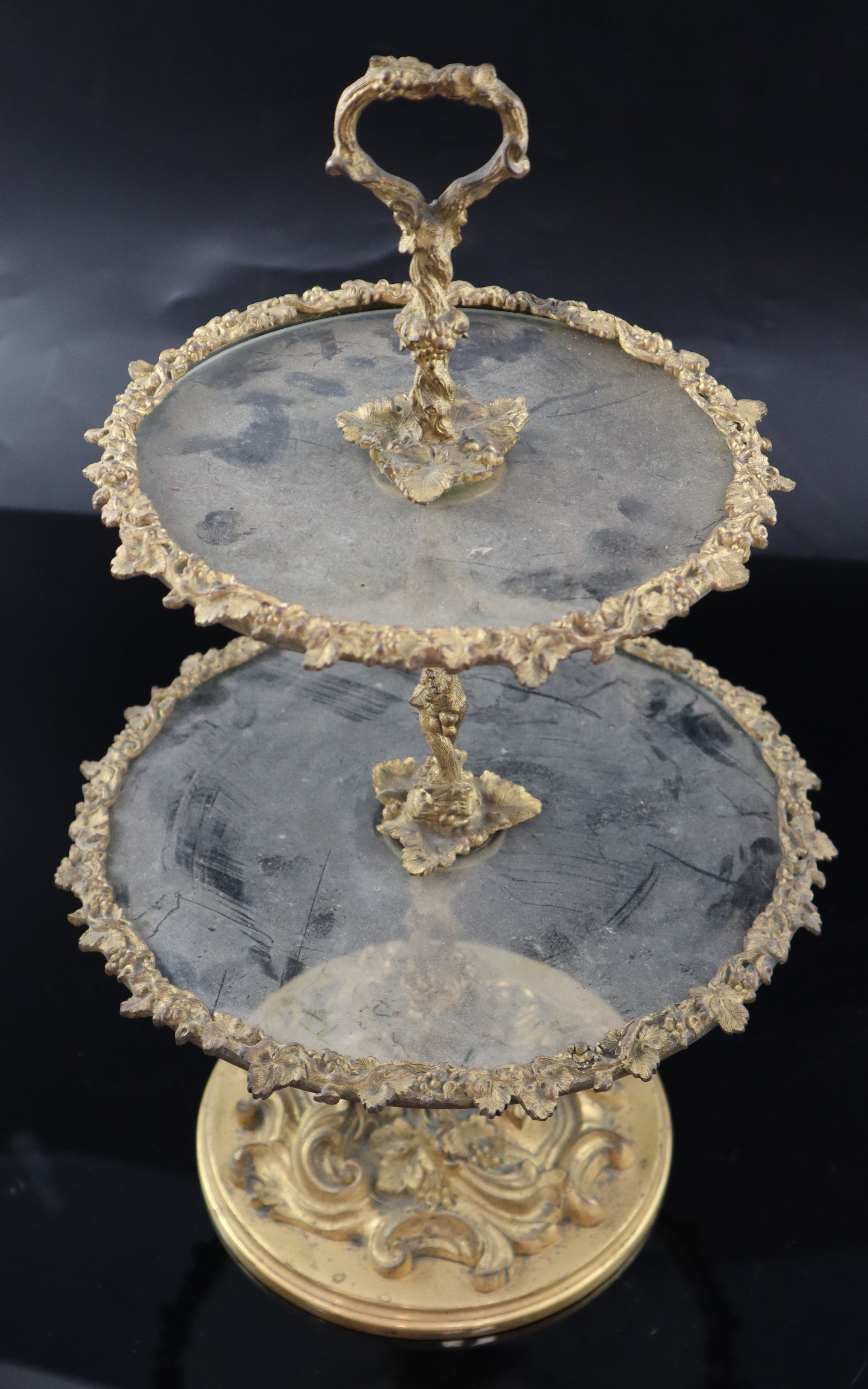 A Victorian ormolu and glass two tier cake stand, height 38cm diameter 24cm
